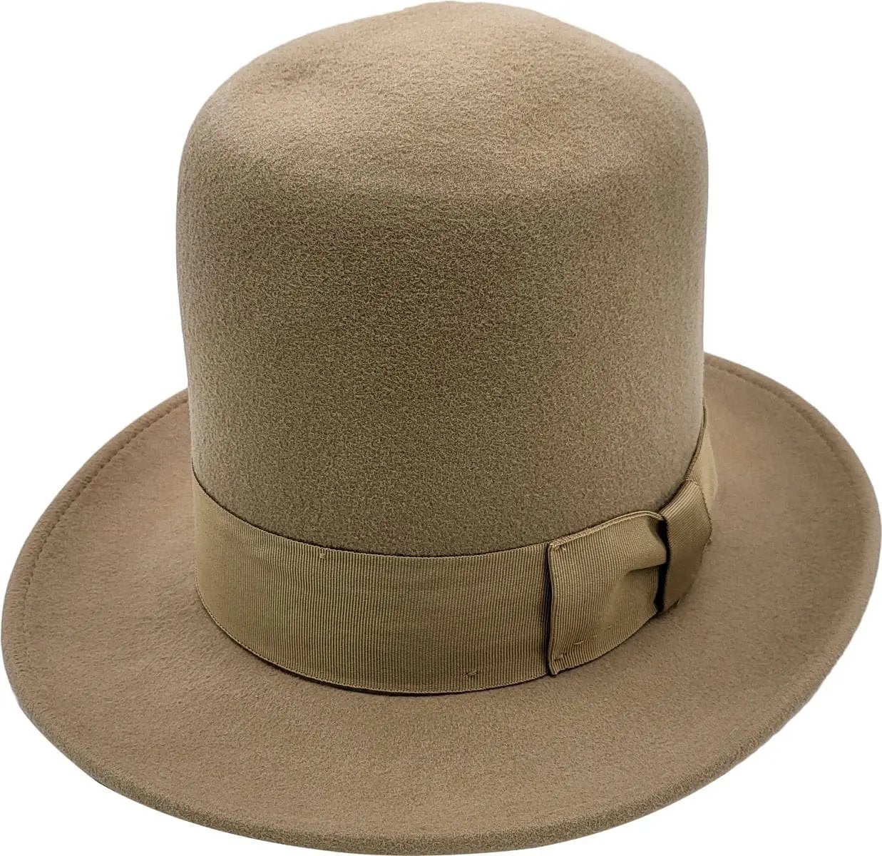 A dramatic 20cm high crown bowler hat handcrafted from 100% luxury wool. This oversized tall bowler features adjustable Velcro fit and elegant ribbon detail. Available in six colors: Black, Burgundy, Teal, Mustard Yellow, Camel Brown, and Royal Blue. A bold theatrical statement piece.