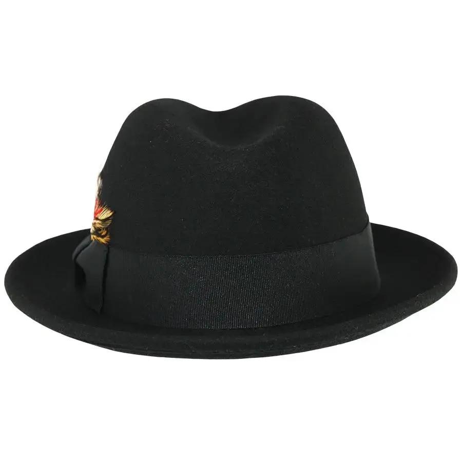 Crushable wool trilby hat with a C-crown. This packable hat is made of 100% wool, featuring a cotton sweatband and no lining. Perfect for travel and everyday wear.
The crushable C-crown trilby hat in black is a stylish and practical accessory. Made from 100% wool, this hat is designed to be packable—simply take it out of a suitcase, shake and shape, and it’s ready to wear. Ideal for both travel and everyday use, this trilby hat combines functionality with timeless style.