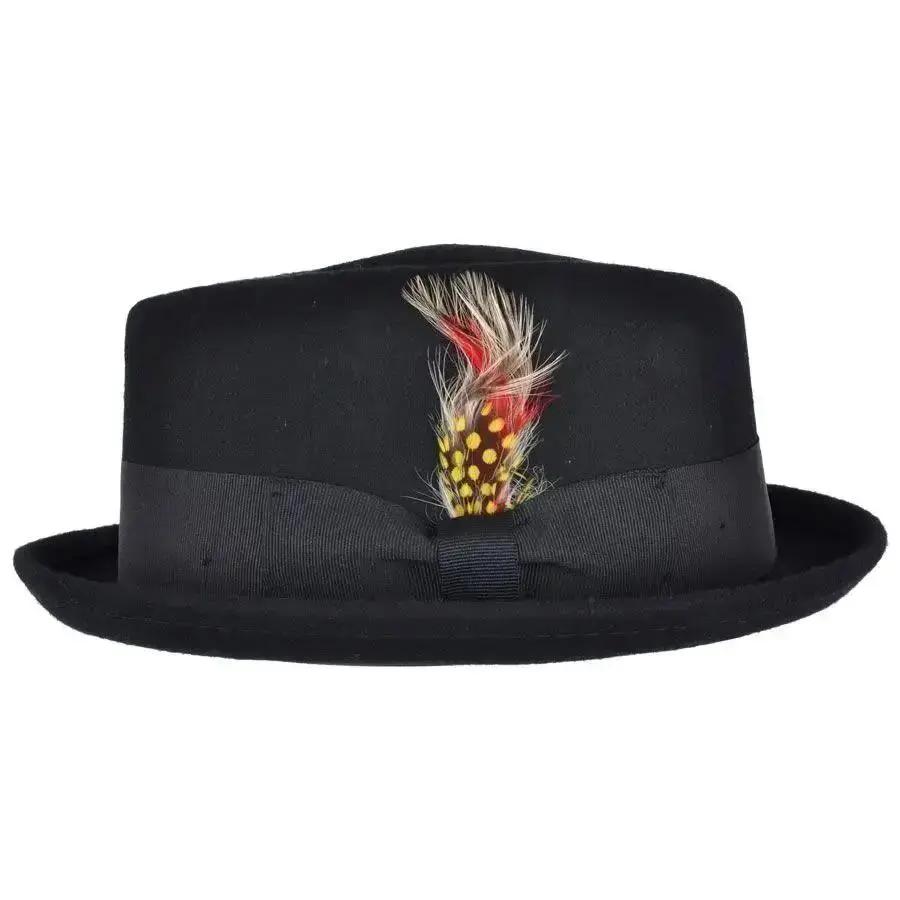 Crushable Wool Felt Diamond Crown Pork Pie Hat. Perfect for travel, this handmade hat features a comfortable cotton sweatband and a removable feather. Available in multiple sizes.
Our Crushable Wool Felt Diamond Crown Pork Pie Hat is packable & perfect for travel, casual wear & special occasions —just take it out of your suitcase, shake and shape, and it’s ready to wear.