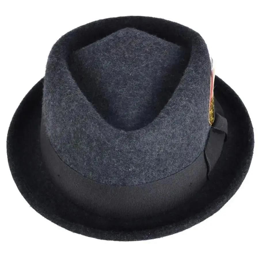 Crushable Wool Felt Diamond Crown Pork Pie Hat. Perfect for travel, this handmade hat features a comfortable cotton sweatband and a removable feather. Available in multiple sizes.
Our Crushable Wool Felt Diamond Crown Pork Pie Hat is packable & perfect for travel, casual wear & special occasions —just take it out of your suitcase, shake and shape, and it’s ready to wear.