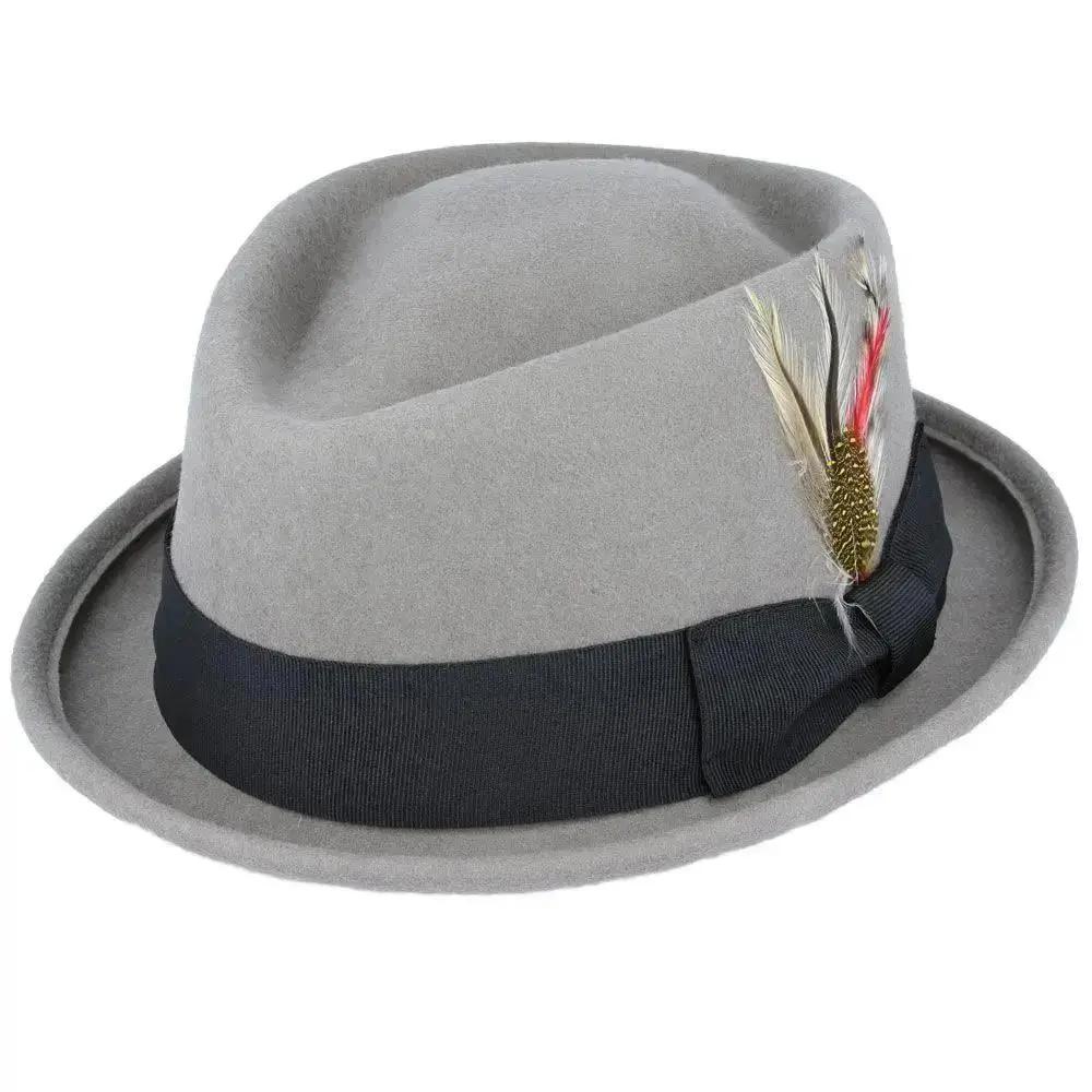 Crushable Wool Felt Diamond Crown Pork Pie Hat. Perfect for travel, this handmade hat features a comfortable cotton sweatband and a removable feather. Available in multiple sizes.
Our Crushable Wool Felt Diamond Crown Pork Pie Hat is packable & perfect for travel, casual wear & special occasions —just take it out of your suitcase, shake and shape, and it’s ready to wear.