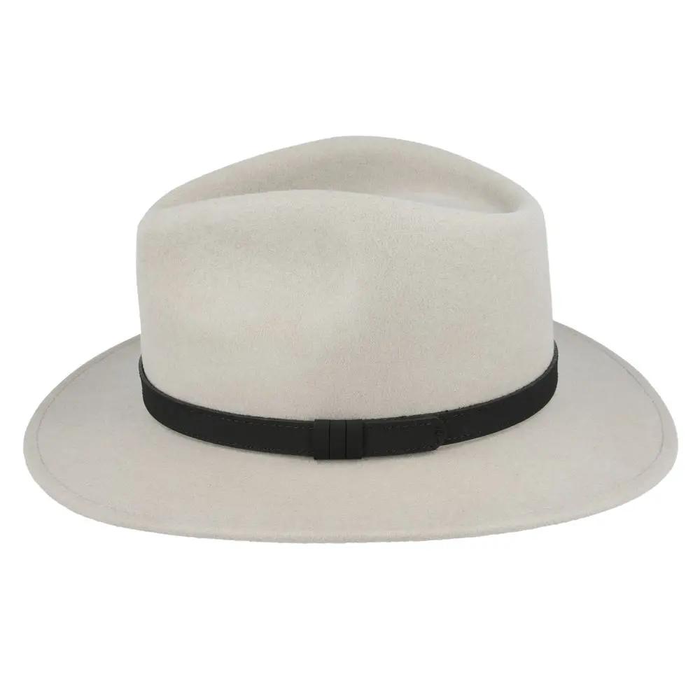 Crushable Wool Fedora Hat with Leather Band. Handmade, unisex, wide-brim (8cm) fedora with a 9cm high teardrop crown, 100% wool, cotton sweatband, and leather strap. Water-resistant and packable. Available in multiple sizes.
The Novella Hats Crushable Wool Fedora Hat is a stylish and functional accessory. Handmade with 100% premium wool, this unisex hat features a classic design with a modern teardrop crown and wide A-line shaped brim.