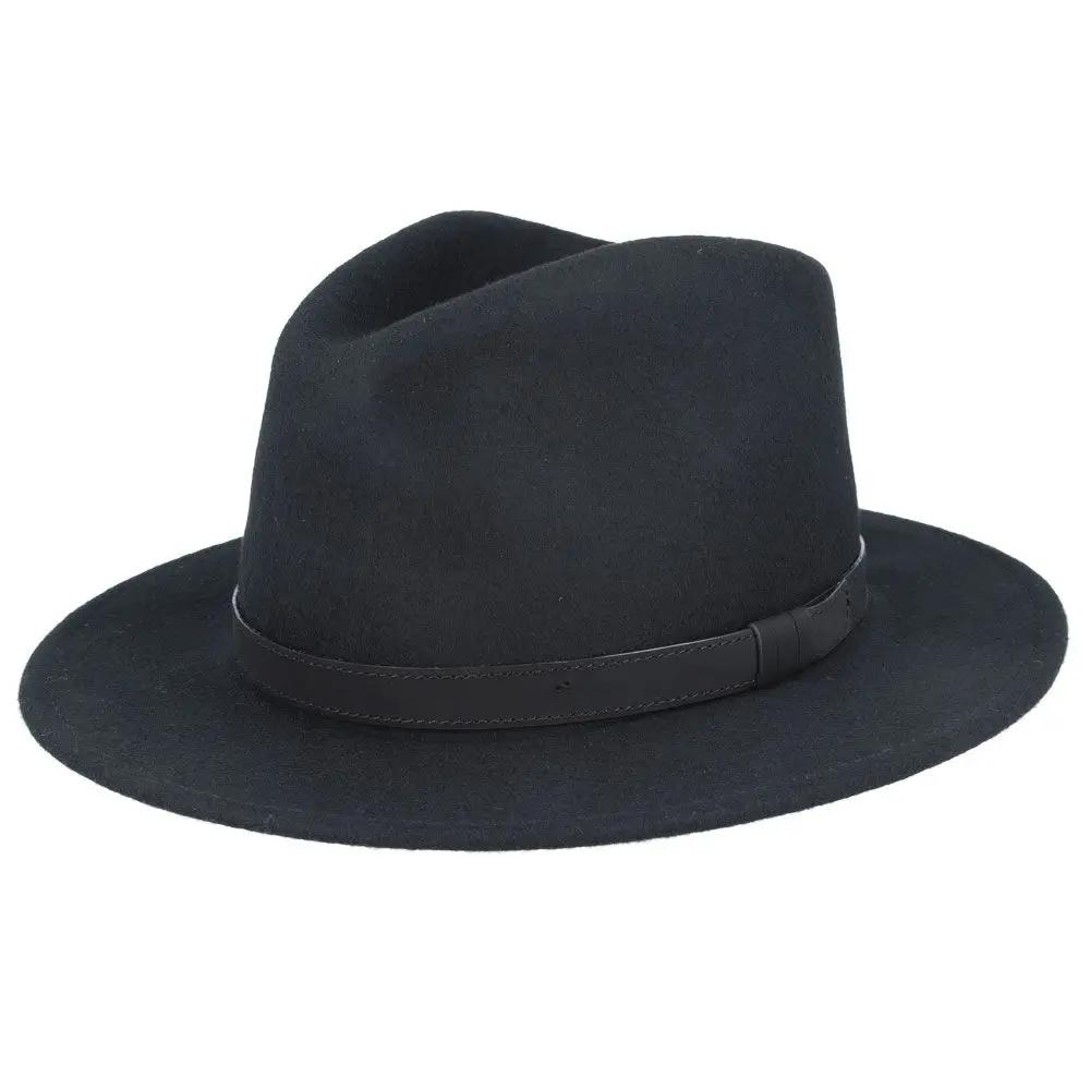 Crushable Wool Fedora Hat with Leather Band. Handmade, unisex, wide-brim (8cm) fedora with a 9cm high teardrop crown, 100% wool, cotton sweatband, and leather strap. Water-resistant and packable. Available in multiple sizes.
The Novella Hats Crushable Wool Fedora Hat is a stylish and functional accessory. Handmade with 100% premium wool, this unisex hat features a classic design with a modern teardrop crown and wide A-line shaped brim.