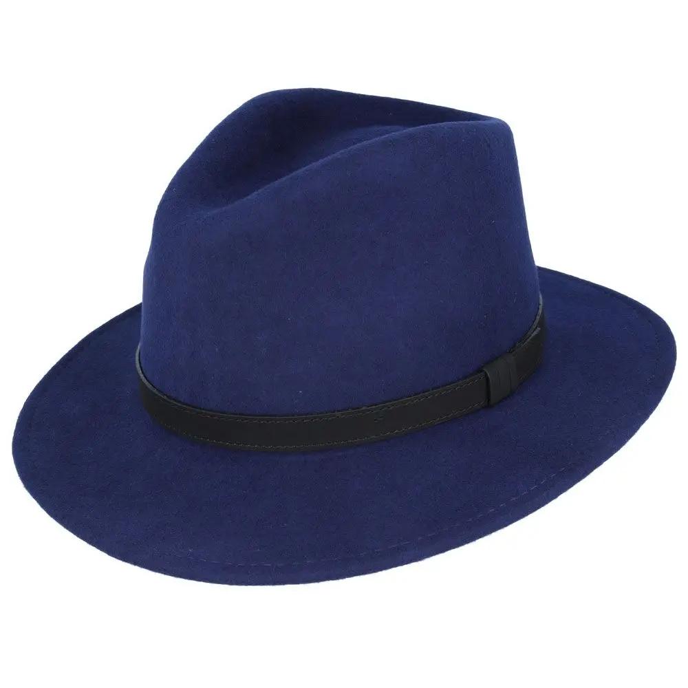 Crushable Wool Fedora Hat with Leather Band. Handmade, unisex, wide-brim (8cm) fedora with a 9cm high teardrop crown, 100% wool, cotton sweatband, and leather strap. Water-resistant and packable. Available in multiple sizes.
The Novella Hats Crushable Wool Fedora Hat is a stylish and functional accessory. Handmade with 100% premium wool, this unisex hat features a classic design with a modern teardrop crown and wide A-line shaped brim.