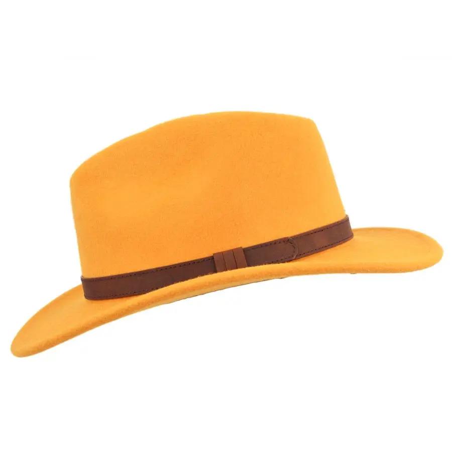 Crushable Wool Fedora Hat with Leather Band. Handmade, unisex, wide-brim (8cm) fedora with a 9cm high teardrop crown, 100% wool, cotton sweatband, and leather strap. Water-resistant and packable. Available in multiple sizes.
The Novella Hats Crushable Wool Fedora Hat is a stylish and functional accessory. Handmade with 100% premium wool, this unisex hat features a classic design with a modern teardrop crown and wide A-line shaped brim.