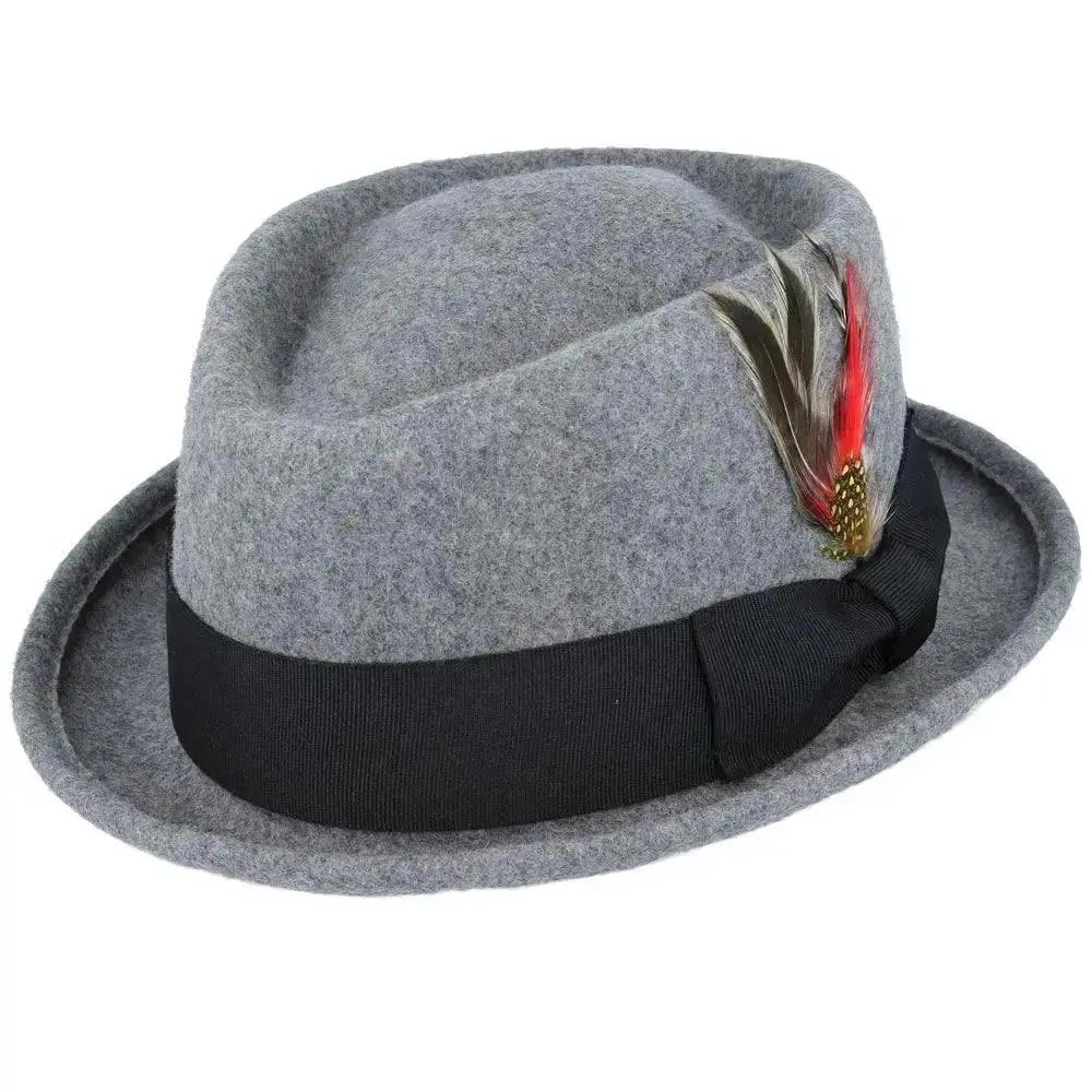 Crushable Wool Felt Diamond Crown Pork Pie Hat. Perfect for travel, this handmade hat features a comfortable cotton sweatband and a removable feather. Available in multiple sizes.
Our Crushable Wool Felt Diamond Crown Pork Pie Hat is packable & perfect for travel, casual wear & special occasions —just take it out of your suitcase, shake and shape, and it’s ready to wear.