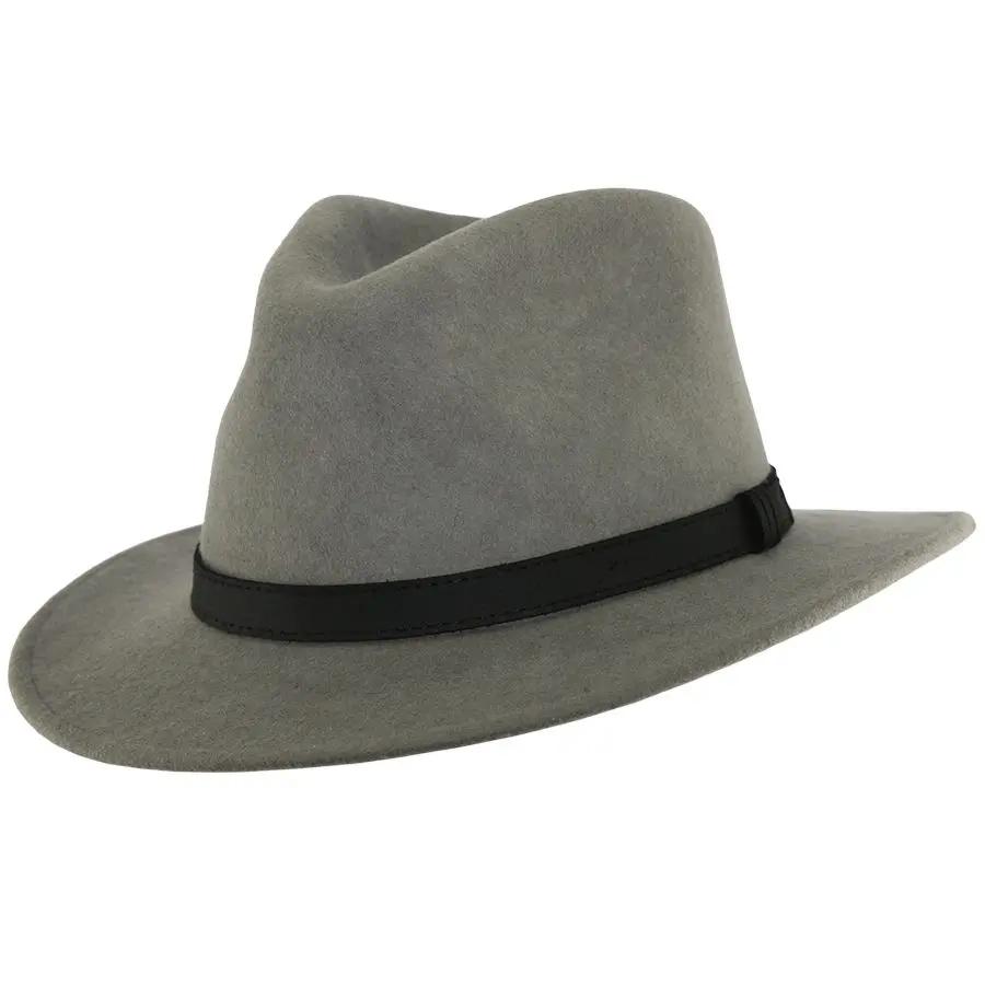 Crushable Wool Fedora Hat with Leather Band. Handmade, unisex, wide-brim (8cm) fedora with a 9cm high teardrop crown, 100% wool, cotton sweatband, and leather strap. Water-resistant and packable. Available in multiple sizes.
The Novella Hats Crushable Wool Fedora Hat is a stylish and functional accessory. Handmade with 100% premium wool, this unisex hat features a classic design with a modern teardrop crown and wide A-line shaped brim.