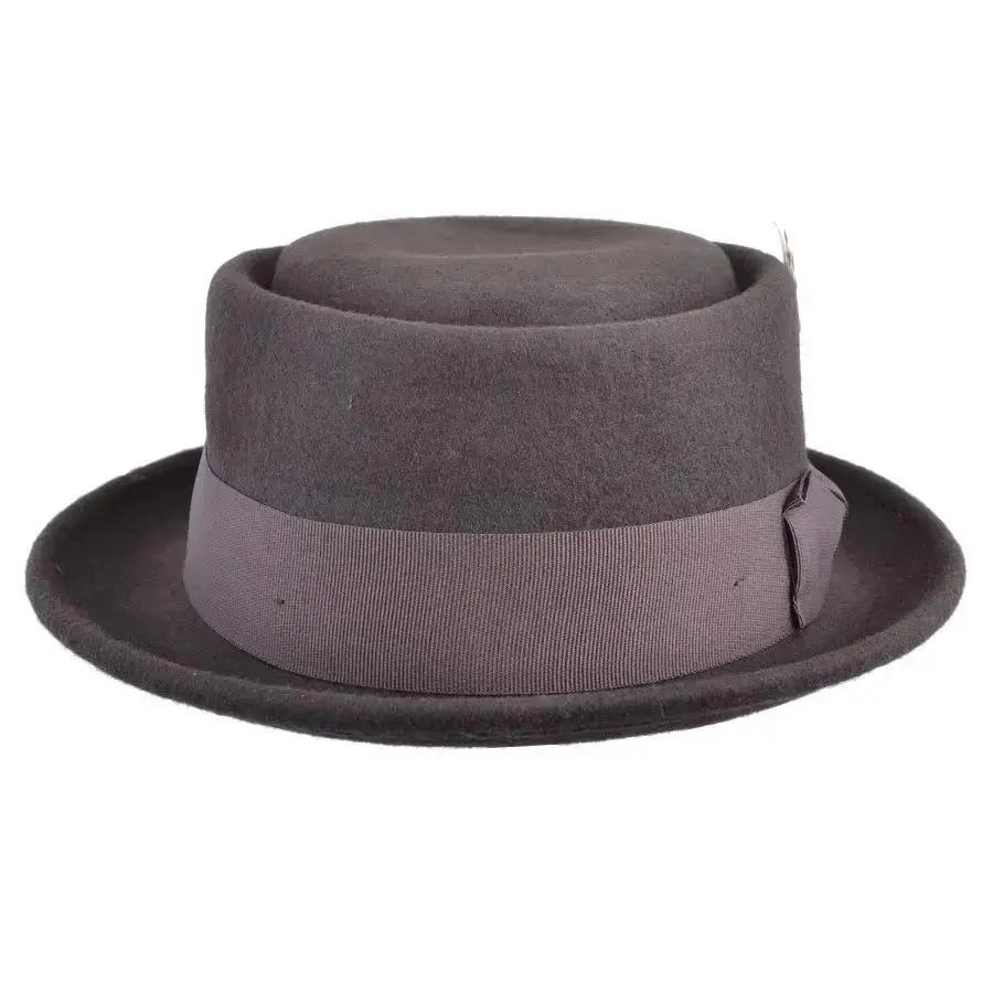 Crushable Wool Felt Pork Pie Hat, a versatile and stylish accessory perfect for any occasion. This hat is packable, allowing you to take it out of a suitcase, shake and shape it, and it’s ready to wear. Handmade from 100% wool felt, it offers both durability and a classic look. Hat Details: Material: 100% Wool