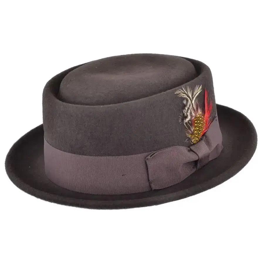 Crushable Wool Felt Pork Pie Hat, a versatile and stylish accessory perfect for any occasion. This hat is packable, allowing you to take it out of a suitcase, shake and shape it, and it’s ready to wear. Handmade from 100% wool felt, it offers both durability and a classic look. Hat Details: Material: 100% Wool