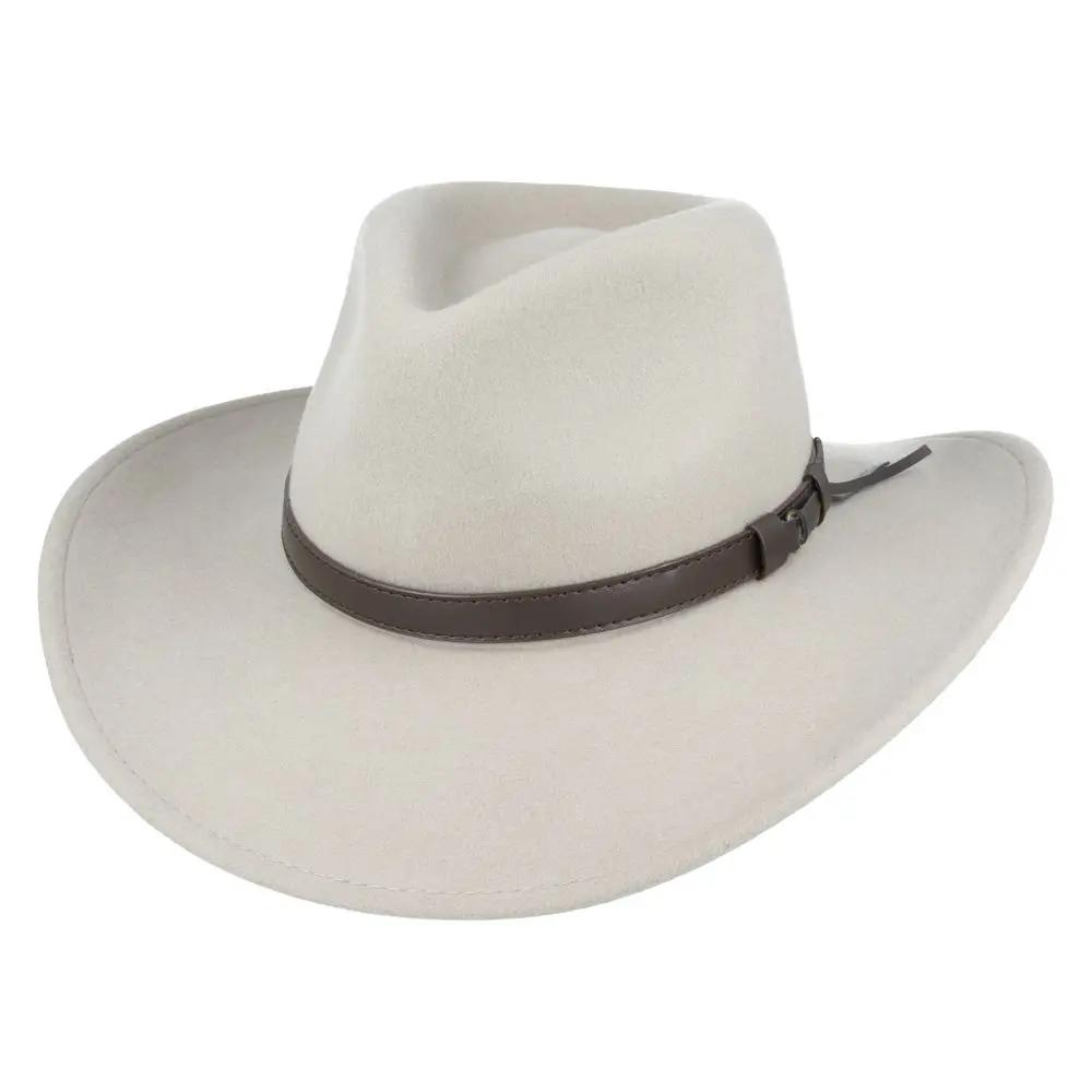 The Crushable Wool Felt Cowboy Hat from the Novella Hats Wool collection combines fashion and function. This handmade hat features a wide brim and high crown, offering both style and practicality. It's packable—just take it out of a suitcase, shake and shape it, and it's ready to wear.