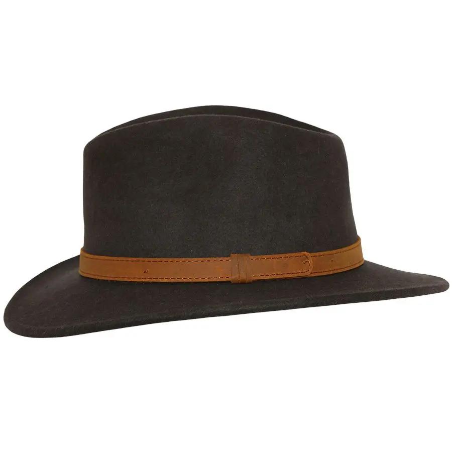 Crushable Wool Fedora Hat with Leather Band. Handmade, unisex, wide-brim (8cm) fedora with a 9cm high teardrop crown, 100% wool, cotton sweatband, and leather strap. Water-resistant and packable. Available in multiple sizes.
The Novella Hats Crushable Wool Fedora Hat is a stylish and functional accessory. Handmade with 100% premium wool, this unisex hat features a classic design with a modern teardrop crown and wide A-line shaped brim.