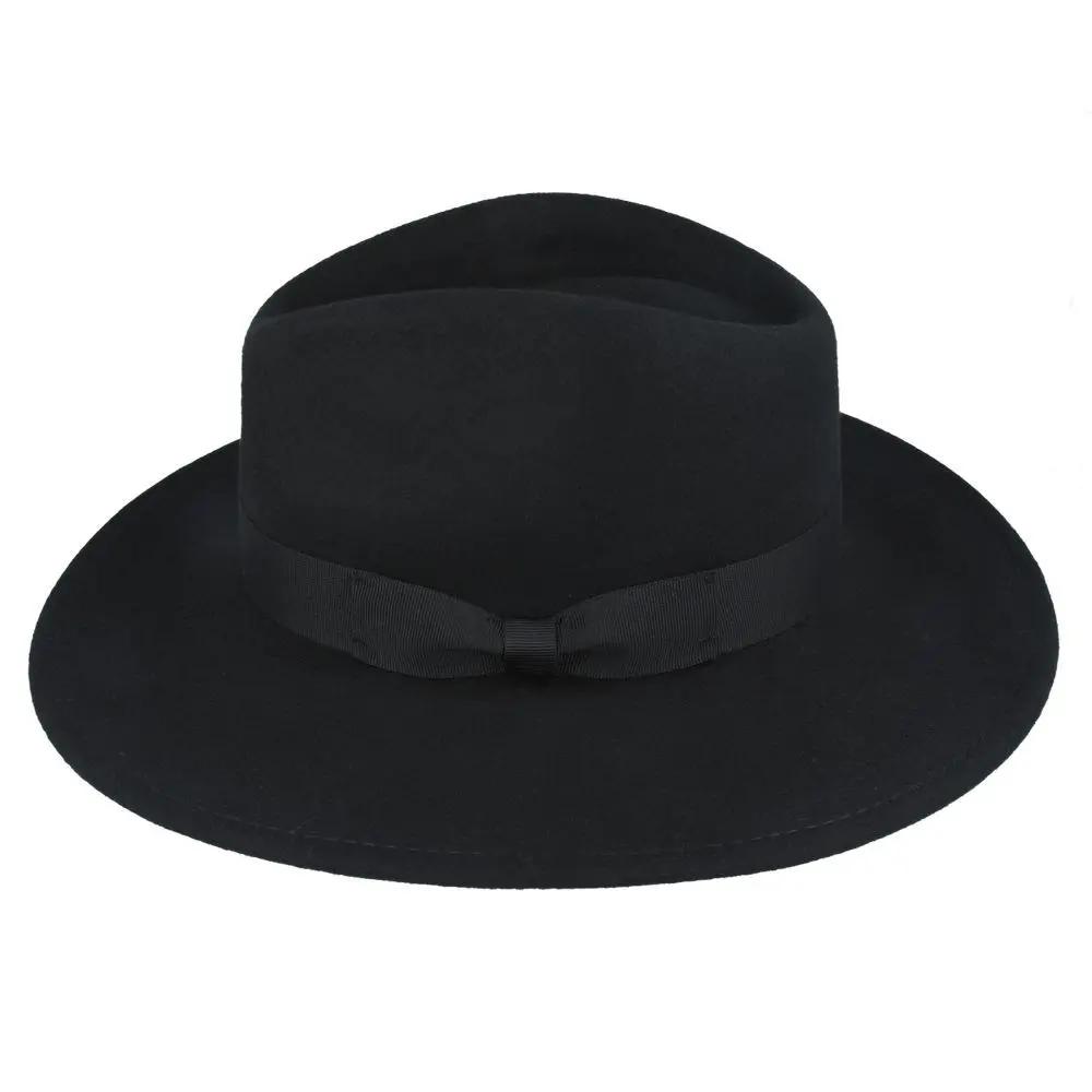 The Wide Brim Wool Crushable Fedora is a versatile, classic hat with an A-line shaped brim. This crushable and water-resistant fedora is perfect for travel—simply pack it, shake it, and wear it. The snap brim allows for different styling options, making it both dressy and practical. Hat Details: Material: 100% Wool
