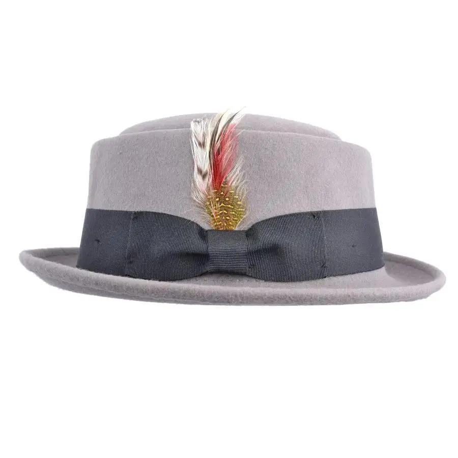 Crushable Wool Felt Pork Pie Hat, a versatile and stylish accessory perfect for any occasion. This hat is packable, allowing you to take it out of a suitcase, shake and shape it, and it’s ready to wear. Handmade from 100% wool felt, it offers both durability and a classic look. Hat Details: Material: 100% Wool