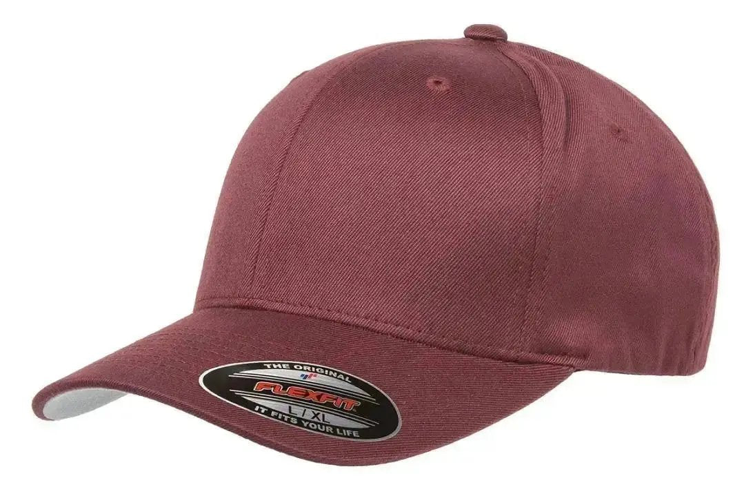 Navy Flexfit Wooly Combed Caps from our UK hat shop. Athletic design with wool-like texture. 63% polyester, 34% cotton, 3% spandex. Features: hard buckram, silver under visor, 8-row stitching. Sizes: S/M (6 3/4" - 7 1/4") and L/XL (7 1/8" - 7 5/8"). Suitable for sports and everyday use.