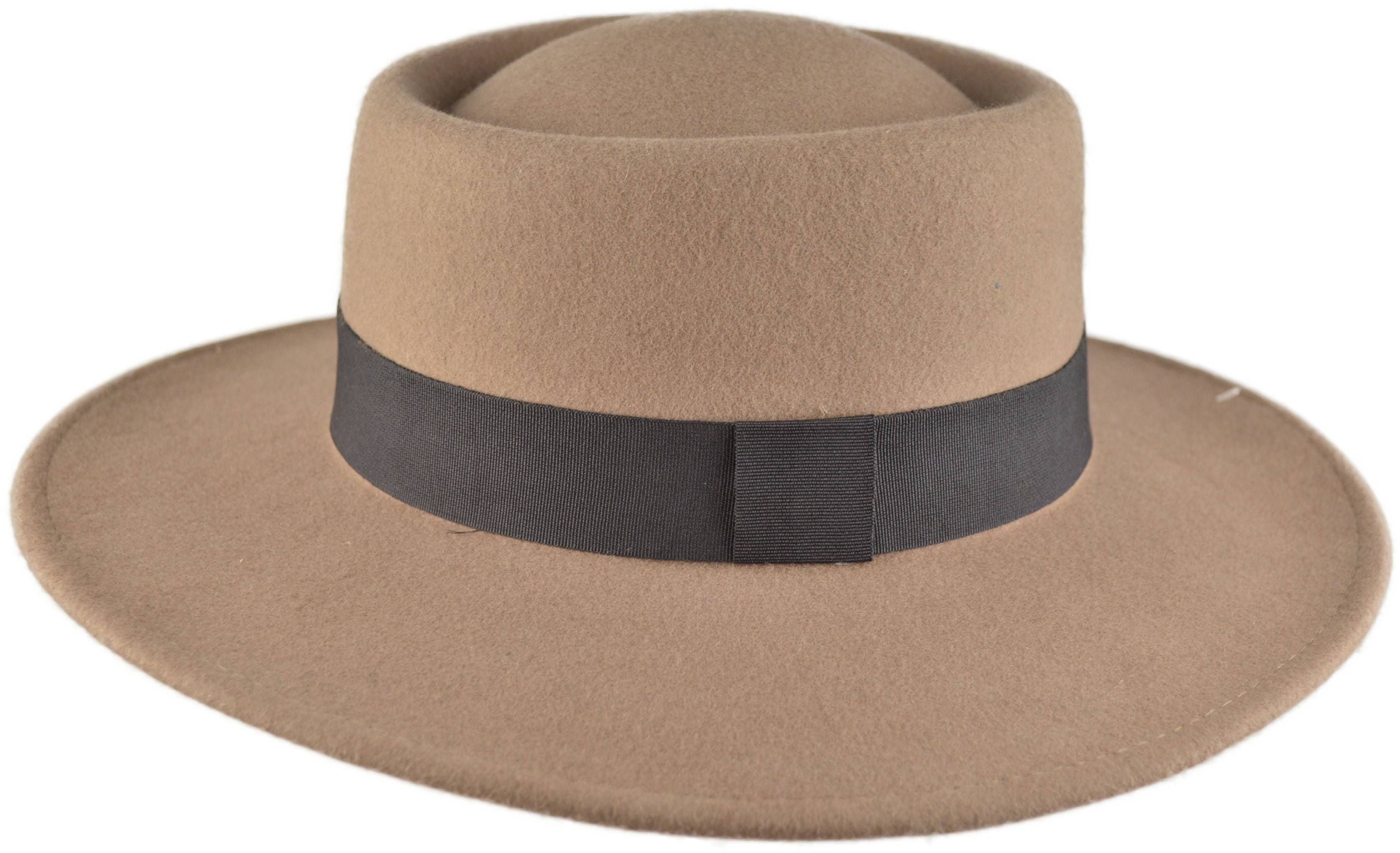 Wide Brim Wool Felt Cloche Hat. Soft, durable wool felt with adjustable interior string for a perfect fit. Classic vintage style meets modern practicality. Ample sun protection with a sophisticated silhouette. Available in Black and Beige. Versatile for both casual and formal occasions.