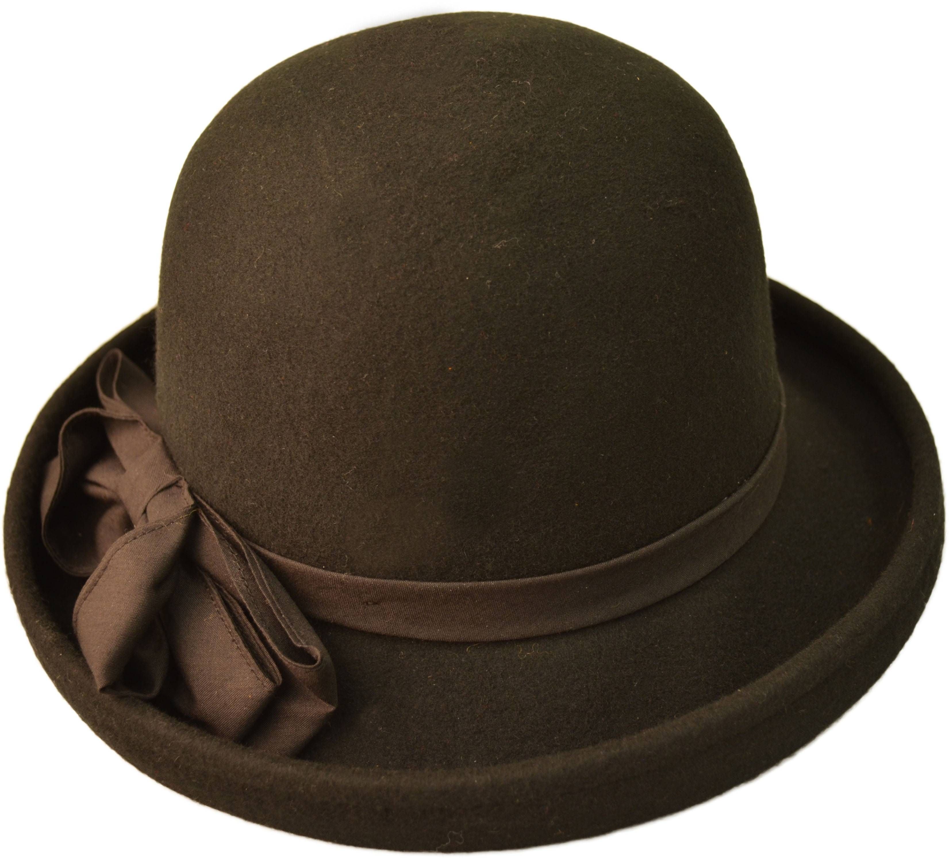 Women's Wool Felt Vintage Cloche Hat. 100% wool construction offers warmth with a soft, comfortable feel. Features an adjustable inner drawstring for a perfect fit. Ideal for elegant soirees, work events, or pairing with a cozy scarf. Classic vintage design meets modern comfort in this versatile accessory.