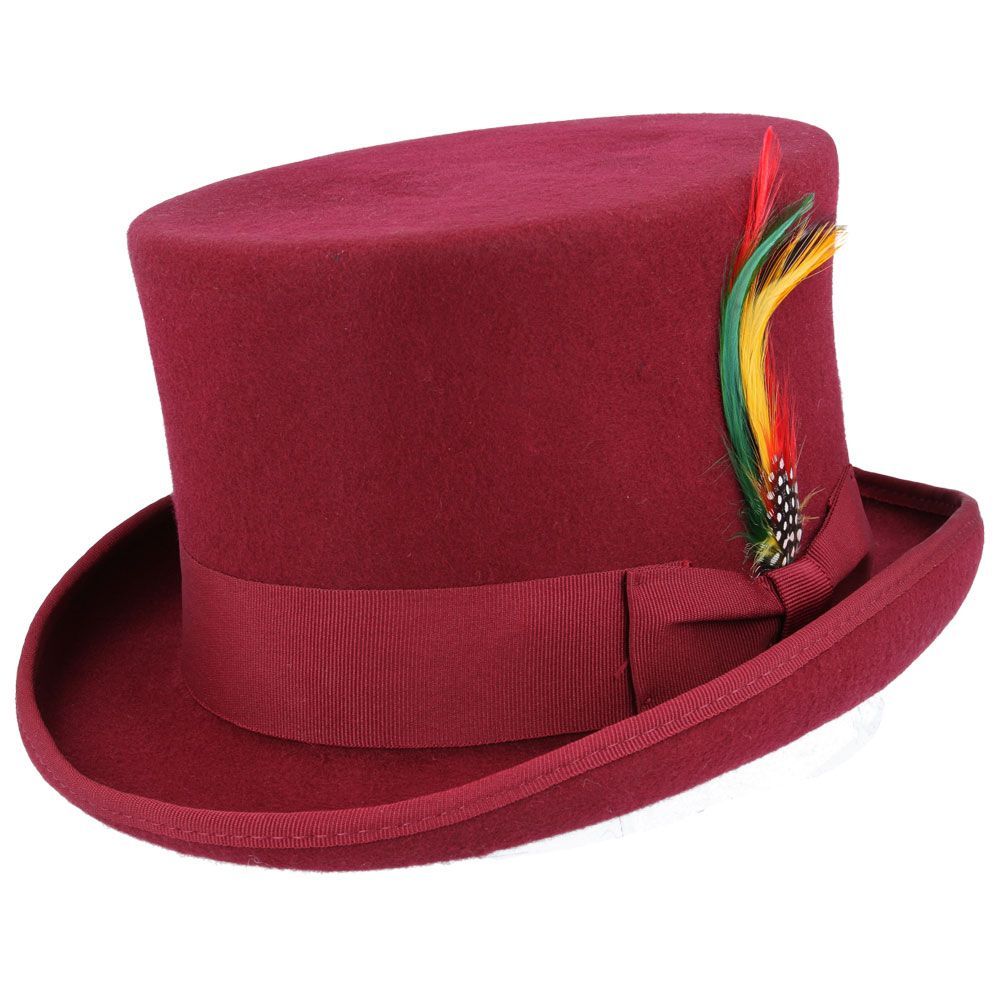 Wool Felt Top Hat - Handcrafted The Wool Felt Top Hat is a handcrafted classic made from 100% wool felt. It features a 5 2/5" high crown, a 2 2/6" wide curved brim, satin lining, and a leather sweatband. The grosgrain hat band and removable feather add a touch of elegance. Hat Details: Hand Made Made of 100% Wool Felt