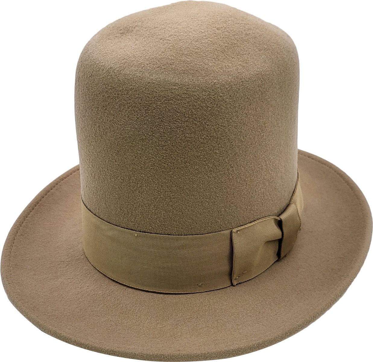 A dramatic 20cm high crown bowler hat handcrafted from 100% luxury wool. This oversized tall bowler features adjustable Velcro fit and elegant ribbon detail. Available in six colors: Black, Burgundy, Teal, Mustard Yellow, Camel Brown, and Royal Blue. A bold theatrical statement piece.