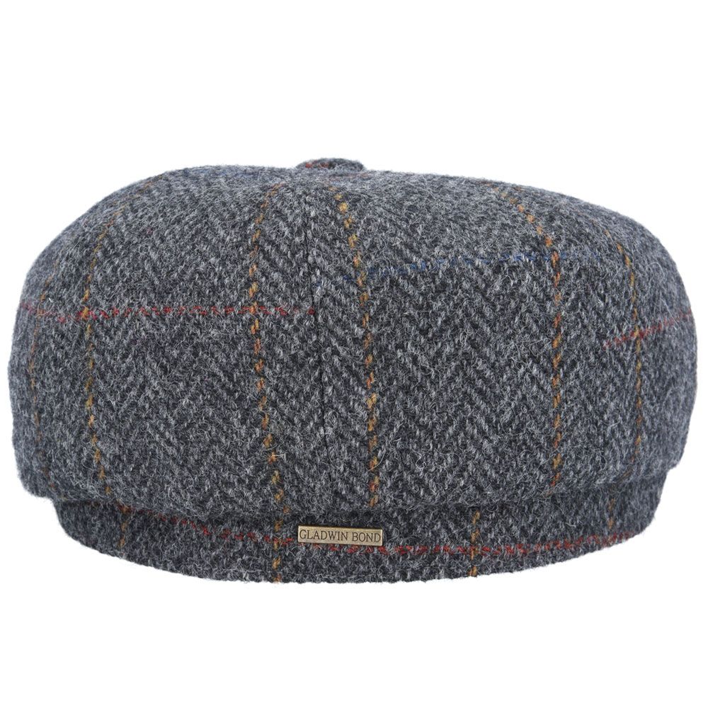 Italian Wool Newsboy Cap in Charcoal. Handcrafted from 100% Italian Wool with a vintage look. Available in multiple sizes. Order now for timeless style!