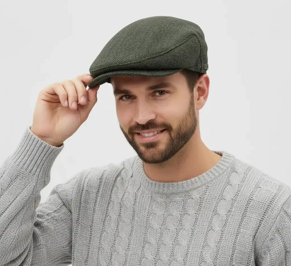 Novella Hats Herringbone Tweed Flat Cap delivers a timeless blend of heritage and modern style. Designed with the classic flat cap silhouette, it’s perfect for everyday wear, casual outings, and smart-casual looks. Its traditional herringbone texture brings an instantly recognisable vintage charm.