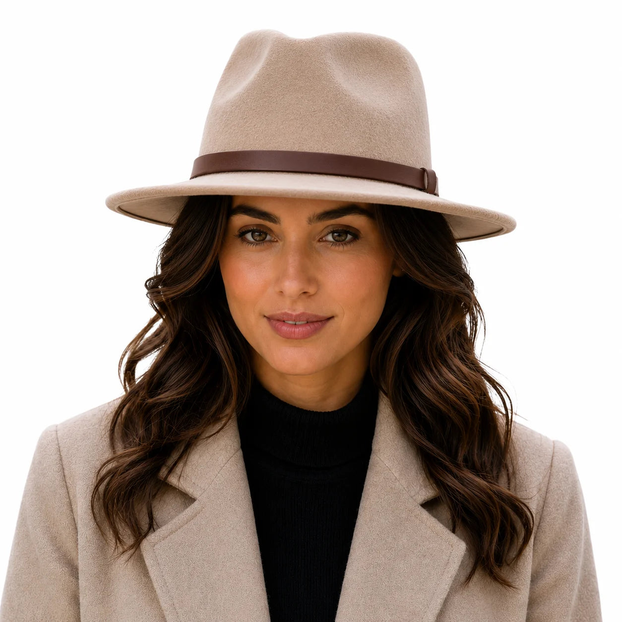 Woman wearing a beige fedora hat with a brown band on a white background