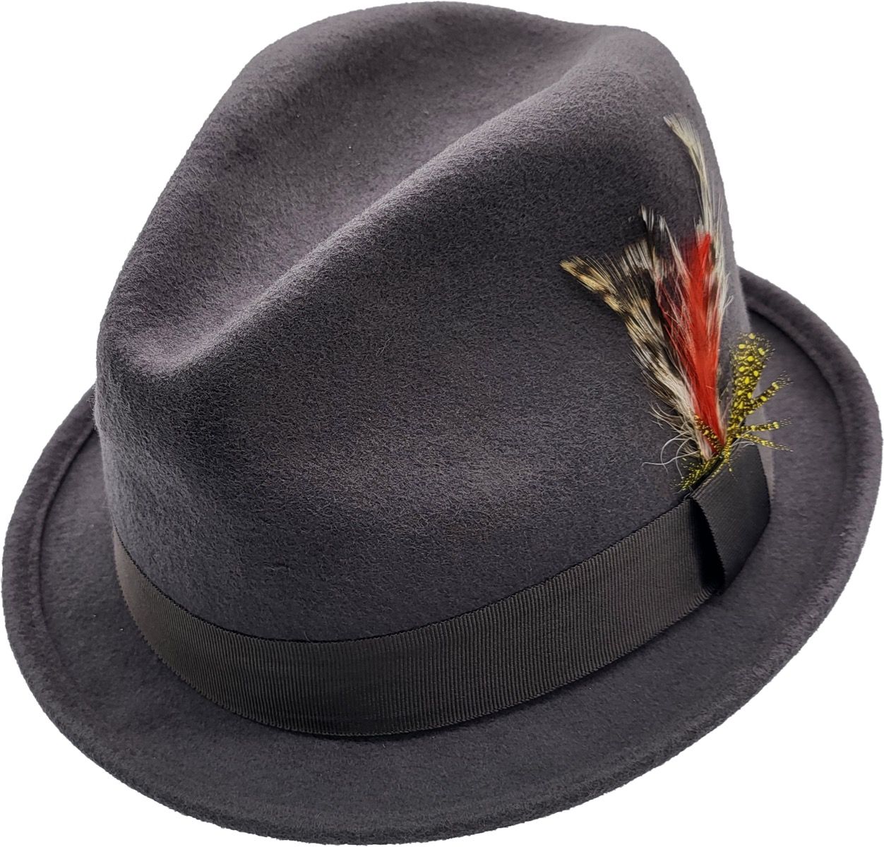 A short-brim Trilby handmade from pure wool felt (sizes 55-60cm). Each hat showcases a grosgrain ribbon, feather detail, and superior craftsmanship. Choose from Black, White, Grey, or Brown. The traditional shape and shorter brim make it versatile for both formal and casual wear.