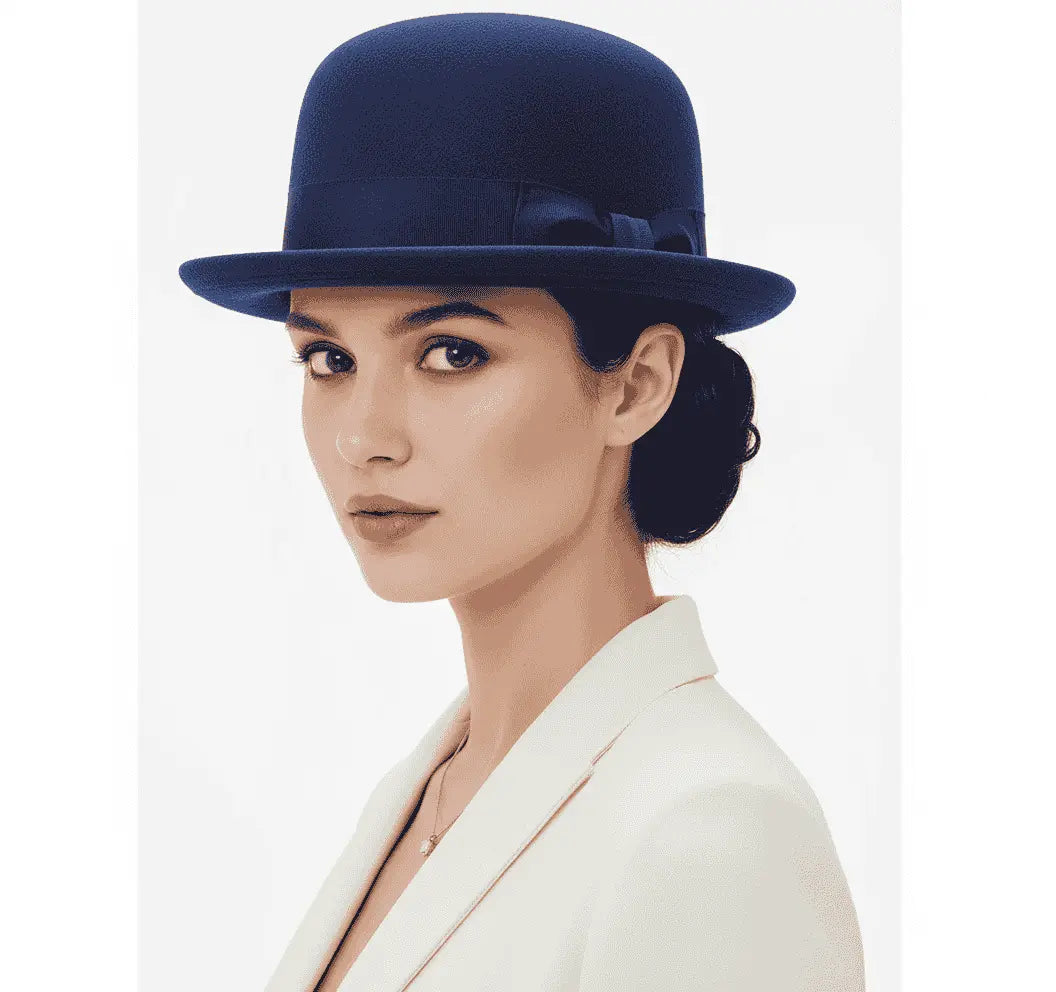 A handcrafted soft bowler hat made from 100% premium wool felt. Features a classic grosgrain band and flexible structure for all-day comfort.