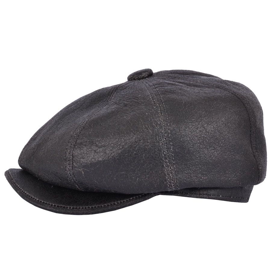 Sheep Skin Newsboy Leather Cap in Brown, crafted from 100% sheepskin leather for a vintage look. Features include a stitched-down brim, cotton lining, and an eight-panel design with a buttoned top. Available in sizes S-XL. Handcrafted with genuine leather for timeless style. Also known as a cabbie hat.