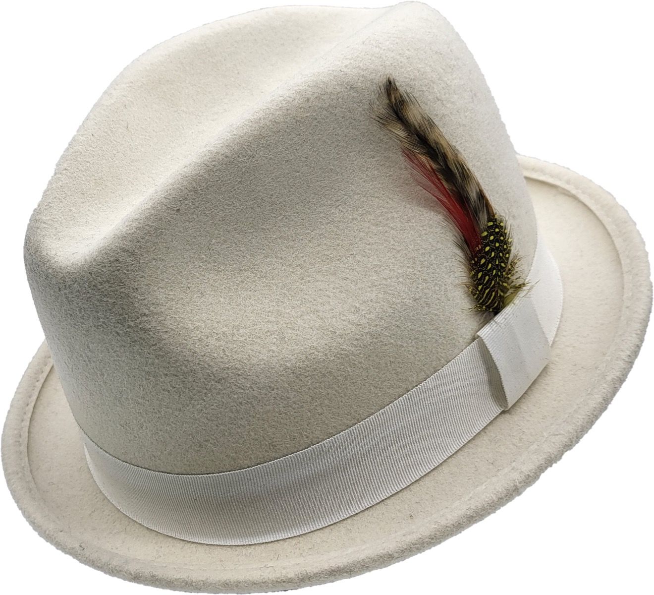 A short-brim Trilby handmade from pure wool felt (sizes 55-60cm). Each hat showcases a grosgrain ribbon, feather detail, and superior craftsmanship. Choose from Black, White, Grey, or Brown. The traditional shape and shorter brim make it versatile for both formal and casual wear.