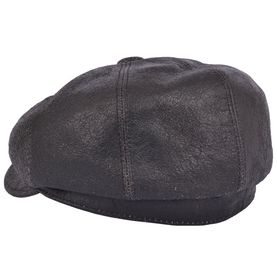 Sheep Skin Newsboy Leather Cap in Brown, crafted from 100% sheepskin leather for a vintage look. Features include a stitched-down brim, cotton lining, and an eight-panel design with a buttoned top. Available in sizes S-XL. Handcrafted with genuine leather for timeless style. Also known as a cabbie hat.