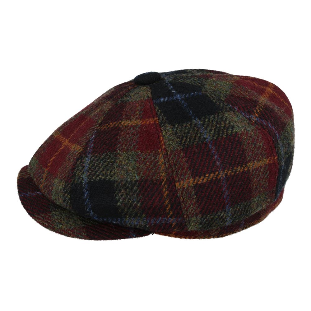 Burgundy Harris Tweed Newsboy Cap, crafted from 100% pure new wool, handwoven in Scotland’s Outer Hebrides. Features include a sewn-down brim, cotton lining, and a removable Gladwin Bond side pin. Available in sizes S-XXL. Inspired by the iconic Peaky Blinders style.